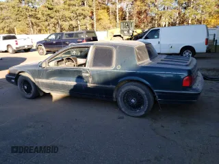 1992 Mercury Cougar z VIN 1MEPM6046NH628614, wystawiony jako Copart lot #77434664 z przebiegiem 83 518 mil mil oraz Szkody całkowita. Historia ofert i sprzedaży dostępna na DreamBid. Obrazek 2.