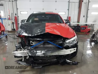 2016 BMW 2 Series M235i with VIN WBA1J7C50GV360056, listed as a IAAI auction lot 41560487 with 120,208 mi miles and . Bid and sale history available at carsss.com. Image 13.