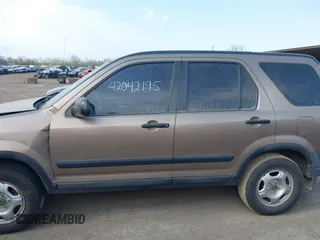2004 Honda CR-V LX with VIN SHSRD77484U232035, listed as a IAAI auction lot 42042195 with 88,725 mi miles and . Bid and sale history available at carsss.com. Image 14.