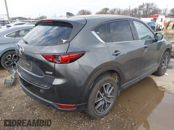 2018 Mazda CX-5 Grand Touring with VIN JM3KFBDM8J0441867, listed as a IAAI auction lot 41565147 with 62,466 mi miles. Bid and sale history available at carsss.com. Image 4.