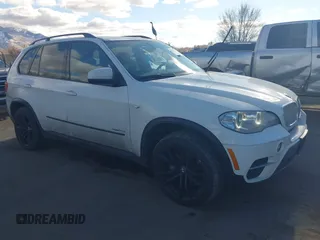 2012 BMW X5 35d with VIN 5UXZW0C56CL665631, listed as a IAAI auction lot 41055705 with 179,408 mi miles and . Bid and sale history available at DreamBid. Image 1.