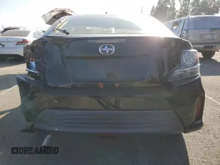 2016 Scion tC z VIN JTKJF5C79GJ020110, wystawiony jako Copart lot #86995214 z przebiegiem 79 165 mil mil oraz Szkody całkowita. Historia ofert i sprzedaży dostępna na DreamBid. Obrazek 6.