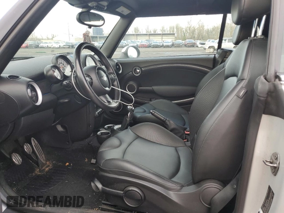2013 MINI Convertible S with VIN WMWZP3C55DT297215, listed as a Copart auction lot 87995095 with Not provided miles and Salvage title. Bid and sale history available at DreamBid. Image 7.