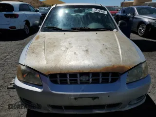 2002 Hyundai Accent GL with VIN KMHCG45C92U353198, listed as a Copart auction lot 68305654 with 130,594 mi miles and Clean Title. Bid and sale history available at carsss.com. Image 5.
