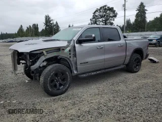 2022 Ram 1500 Rebel with VIN 1C6SRFLT2NN142018, listed as a Copart auction lot 62364525 with 64,044 mi miles and Salvage title. Bid and sale history available at DreamBid. Image 1.