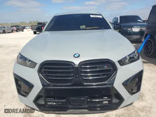 2024 BMW X6 M with VIN 5YM23ET04R9S28947, listed as a Copart auction lot 77666914 with 21,814 mi miles and Non Repairable. Bid and sale history available at carsss.com. Image 5.