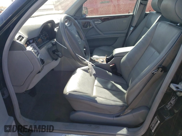 2001 Mercedes-Benz E-Class with VIN WDBJF65J01B325792, listed as a Copart auction lot 76328704 with 101,886 mi miles and Salvage Title. Bid and sale history available at carsss.com. Image 7.