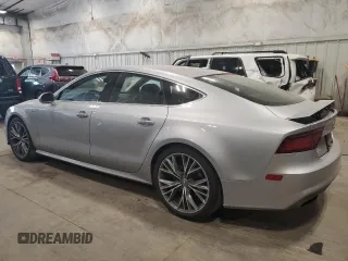2016 Audi A7 3.0 Prestige with VIN WAU2GAFC7GN104801, listed as a Copart auction lot 64997833 with 74,427 mi miles. Bid and sale history available at carsss.com. Image 2.