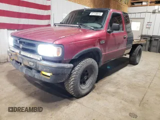 1996 Mazda B-Series Truck z VIN 4F4CR17U5TTM43191, wystawiony jako Copart lot #57178815 z przebiegiem 259 459 mil mil oraz Szkody całkowita. Historia ofert i sprzedaży dostępna na DreamBid. Obrazek 1.