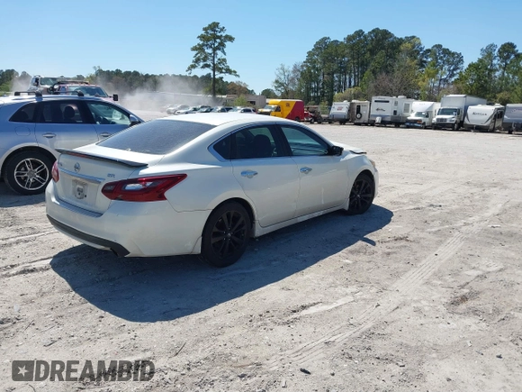 2017 Nissan Altima SR with VIN 1N4AL3AP1HC280813, listed as a IAAI auction lot 41879263 with 148,644 mi miles and . Bid and sale history available at carsss.com. Image 4.