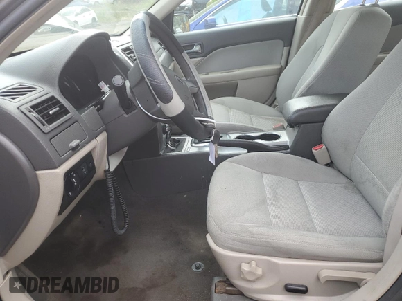 2010 Ford Fusion SE with VIN 3FAHP0HA2AR304143, listed as a Copart auction lot 56181895 with 136,936 mi miles and Salvage title. Bid and sale history available at DreamBid. Image 7.