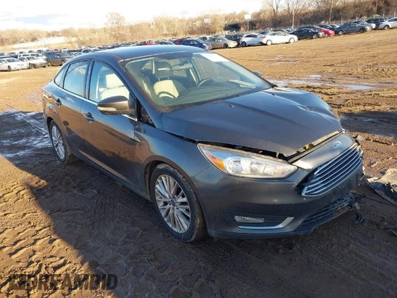 2015 Ford Focus Titanium with VIN 1FADP3J28FL348625, listed as a IAAI auction lot 41674741 with 223,585 mi miles and . Bid and sale history available at carsss.com. Image 1.