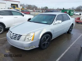 2006 Cadillac DTS w/1SC with VIN 1G6KD57Y56U101903, listed as a IAAI auction lot 41710160 with 151,057 mi miles. Bid and sale history available at carsss.com. Image 17.