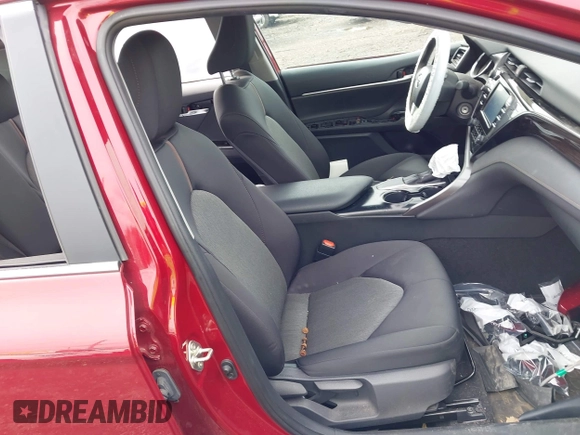 2019 Toyota Camry LE with VIN 4T1B11HK8KU823736, listed as a IAAI auction lot 42166696 with 21,732 mi miles and . Bid and sale history available at DreamBid. Image 5.