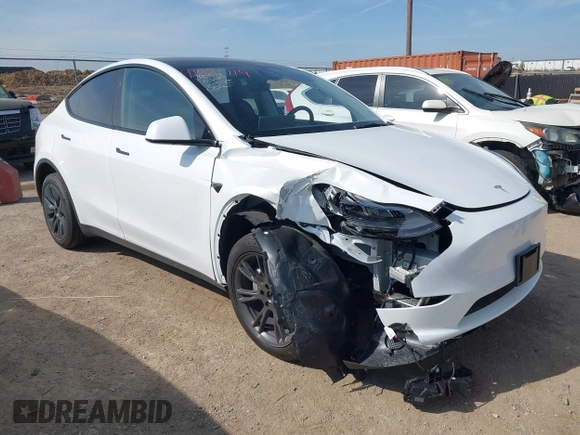 2025 Tesla Model Y Long Range z VIN 7SAYGDED7SA373784, wystawiony jako IAAI lot #41881719 z przebiegiem 1 192 mil mil oraz . Historia ofert i sprzedaży dostępna na DreamBid. Obrazek 1.