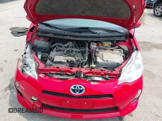2014 Toyota Prius One z VIN JTDKDTB37E1566373, wystawiony jako IAAI lot #42416089 z przebiegiem 61 672 mil mil oraz . Historia ofert i sprzedaży dostępna na DreamBid. Obrazek 10.