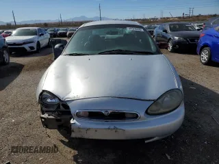 1996 Mercury Sable LS z VIN 1MELM53S7TA600376, wystawiony jako Copart lot #45529455 z przebiegiem 184 855 mil mil oraz Szkody całkowita. Historia ofert i sprzedaży dostępna na DreamBid. Obrazek 5.