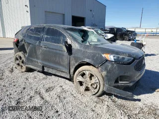 2021 Ford Edge ST z VIN 2FMPK4AP8MBA57400, wystawiony jako Copart lot #50099815 z przebiegiem Nie podano mil oraz Szkoda całkowita • Salvage title. Historia ofert i sprzedaży dostępna na DreamBid. Obrazek 4.
