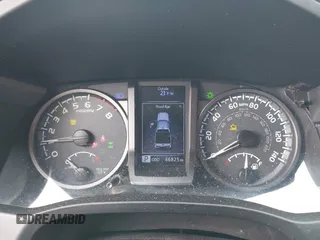 2019 Toyota Tacoma SR z VIN 3TMCZ5AN8KM211246, wystawiony jako IAAI lot #41574346 z przebiegiem 66 825 mil mil oraz . Historia ofert i sprzedaży dostępna na DreamBid. Obrazek 7.
