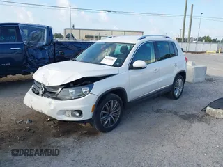 2013 Volkswagen Tiguan SE with VIN WVGAV7AX5DW545202, listed as a IAAI auction lot 42318584 with 91,556 mi miles and . Bid and sale history available at DreamBid. Image 17.