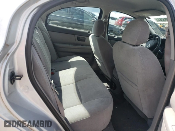 2004 Mercury Sable GS z VIN 1MEFM50UX4A619346, wystawiony jako Copart lot #71295284 z przebiegiem 71 883 mil mil oraz Szkoda całkowita • Salvage title. Historia ofert i sprzedaży dostępna na DreamBid. Obrazek 10.