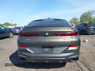 2021 BMW X6 sDrive40i z VIN 5UXCY4C06M9F26841, wystawiony jako IAAI lot #42122749 z przebiegiem 10 072 mil mil oraz . Historia ofert i sprzedaży dostępna na DreamBid. Obrazek 15.