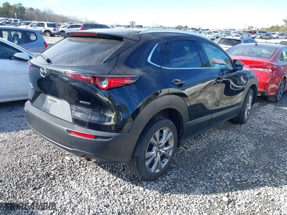 2023 Mazda CX-30 2.5 S Premium Package with VIN 3MVDMBDM7PM528297, listed as a IAAI auction lot 41637542 with 48,935 mi miles. Bid and sale history available at carsss.com. Image 4.