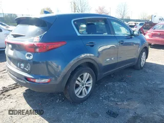2018 Kia Sportage LX with VIN KNDPM3AC1J7424163, listed as a IAAI auction lot 41989534 with 87,220 mi miles and . Bid and sale history available at carsss.com. Image 4.
