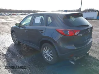 2015 Mazda CX-5 Sport with VIN JM3KE4BY1F0543507, listed as a IAAI auction lot 41530491 with 127,995 mi miles. Bid and sale history available at carsss.com. Image 3.
