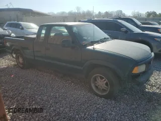 1997 GMC Sonoma SLS with VIN 1GTCS19X2V8528113, listed as a Copart auction lot 48530915 with 214,072 mi miles and Salvage Title. Bid and sale history available at DreamBid. Image 4.