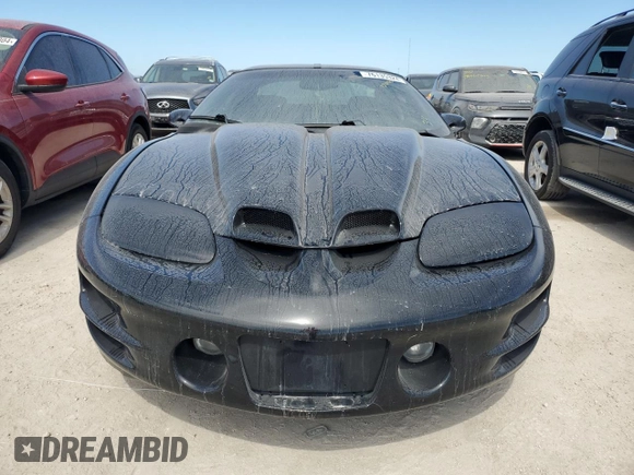 2000 Pontiac Firebird Formula z VIN 2G2FV22G9Y2140113, wystawiony jako Copart lot #76135324 z przebiegiem Nie podano mil oraz Szkoda całkowita • Salvage title. Historia ofert i sprzedaży dostępna na DreamBid. Obrazek 5.
