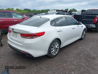 2018 Kia Optima S with VIN 5XXGT4L36JG265878, listed as a IAAI auction lot 42302801 with 101,927 mi miles and . Bid and sale history available at DreamBid. Image 4.