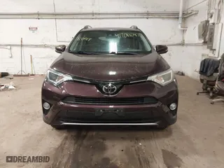 2017 Toyota RAV4 XLE with VIN 2T3RFREV3HW679851, listed as a IAAI auction lot 41708097 with 128,482 mi miles. Bid and sale history available at carsss.com. Image 13.