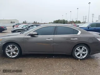 2012 Nissan Maxima 3.5 SV with VIN 1N4AA5AP5CC815460, listed as a IAAI auction lot 41332405 with 173,855 mi miles. Bid and sale history available at carsss.com. Image 14.