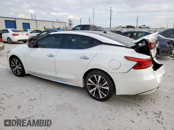 2016 Nissan Maxima SL with VIN 1N4AA6AP7GC376354, listed as a Copart auction lot 63635655 with 110,547 mi miles and Salvage title. Bid and sale history available at DreamBid. Image 2.