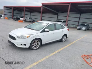 2015 Ford Focus SE with VIN 1FADP3F23FL255584, listed as a IAAI auction lot 41990636 with 151,389 mi miles. Bid and sale history available at carsss.com. Image 2.