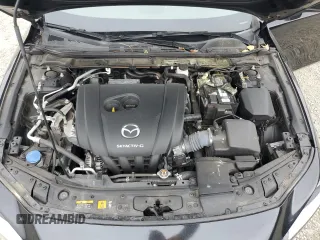 2021 Mazda 3 2.0 z VIN 3MZBPAA7XMM203287, wystawiony jako Copart lot #60079135 z przebiegiem 49 212 mil mil oraz Szkoda całkowita • Salvage title. Historia ofert i sprzedaży dostępna na DreamBid. Obrazek 11.