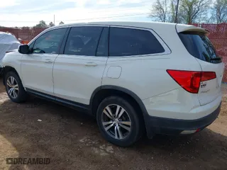 2017 Honda Pilot EX-L with VIN 5FNYF5H58HB044131, listed as a IAAI auction lot 41843395 with 122,311 mi miles. Bid and sale history available at carsss.com. Image 3.