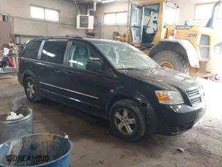 2009 Dodge Grand Caravan SXT with VIN 2D8HN54X79R591960, listed as a IAAI auction lot 41652077 with 194,383 mi miles. Bid and sale history available at carsss.com. Image 1.