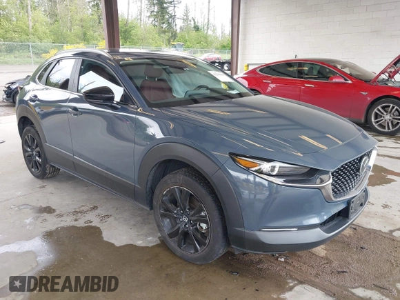 2023 Mazda CX-30 S Carbon Edition with VIN 3MVDMBCM1PM558865, listed as a IAAI auction lot 42298416 with 19,276 mi miles and . Bid and sale history available at DreamBid. Image 1.