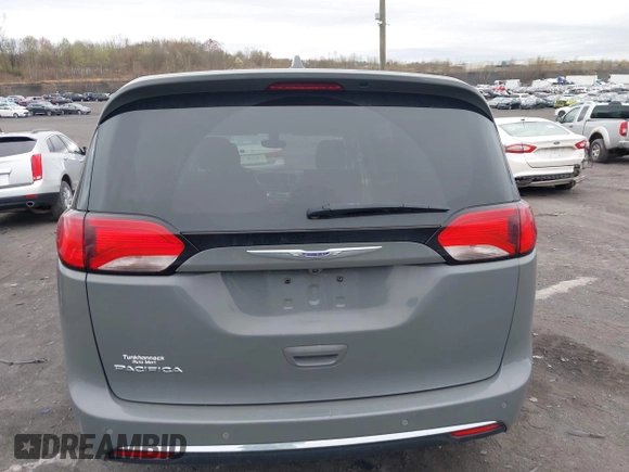 2020 Chrysler Pacifica Touring with VIN 2C4RC1FG3LR245765, listed as a IAAI auction lot 42069689 with 40,869 mi miles and . Bid and sale history available at DreamBid. Image 16.