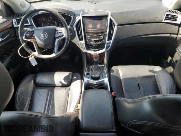2015 Cadillac SRX Luxury Collection z VIN 3GYFNBE31FS634519, wystawiony jako Copart lot #57292645 z przebiegiem 93 777 mil mil oraz Szkody całkowita. Historia ofert i sprzedaży dostępna na DreamBid. Obrazek 8.