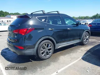 2018 Hyundai Santa Fe Ultimate with VIN 5NMZW4LA4JH054307, listed as a IAAI auction lot 42532426 with 148,299 mi miles and . Bid and sale history available at DreamBid. Image 4.
