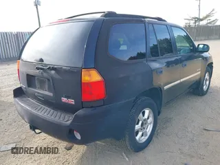 2006 GMC Envoy SLT with VIN 1GKDS13SX62260454, listed as a IAAI auction lot 41479478 with 255,019 mi miles. Bid and sale history available at carsss.com. Image 4.