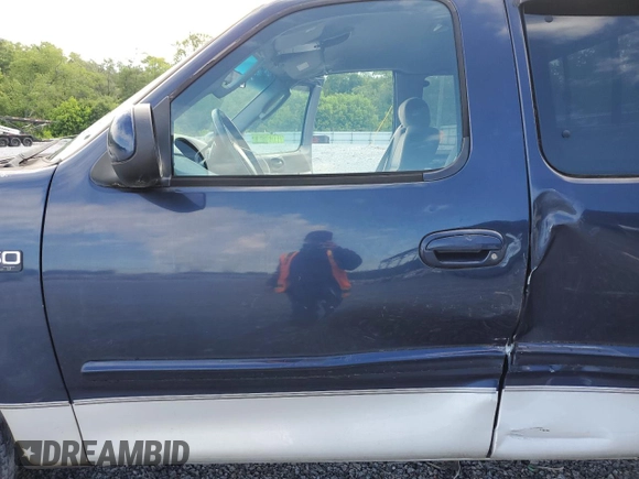 2002 Ford F-150 XL with VIN 1FTRX17232NB20820, listed as a Copart auction lot 55062355 with 231,726 mi miles and Salvage title. Bid and sale history available at DreamBid. Image 7.
