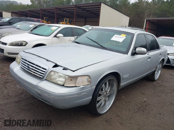 2001 Ford Crown Victoria LX с VIN 2FAFP74W21X143151, выставлен на аукционе IAAI как лот 41471923 с пробегом 207 583 миль миль и . История ставок и продаж доступна на DreamBid. Изображение 2.
