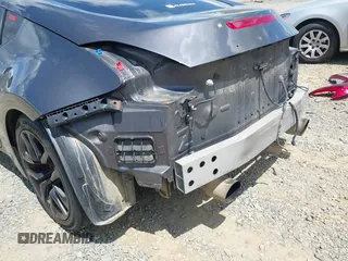 2010 Nissan 370Z Touring z VIN JN1AZ4EH1AM502464, wystawiony jako IAAI lot #42180616 z przebiegiem 145 598 mil mil oraz . Historia ofert i sprzedaży dostępna na DreamBid. Obrazek 6.