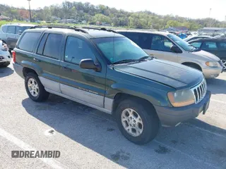 2000 Jeep Grand Cherokee Laredo z VIN 1J4GW48S7YC246414, wystawiony jako IAAI lot #41957610 z przebiegiem Nie podano mil oraz . Historia ofert i sprzedaży dostępna na DreamBid. Obrazek 1.