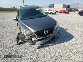 2014 Mazda CX-5 Touring with VIN JM3KE4CY6E0375084, listed as a Copart auction lot 46344065 with 143,828 mi miles and Salvage Title. Bid and sale history available at carsss.com. Image 11.