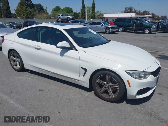 2015 BMW 4 Series 428i with VIN WBA3N7C54FK225367, listed as a IAAI auction lot 41958685 with 142,104 mi miles. Bid and sale history available at carsss.com. Image 1.